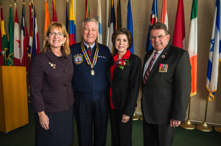 Dallas Veterans Day Parade Committee Chairperson, Tracy Fisher, Chapter Commander Capt Paul Brown, Cathy Brown, Past Chairperson LTC King Moss